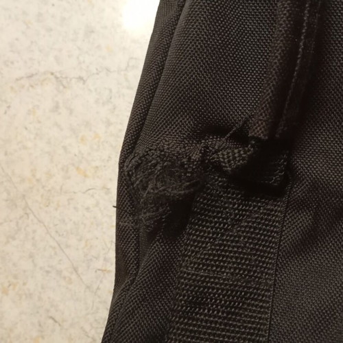 Laptop bag used with repairable damage