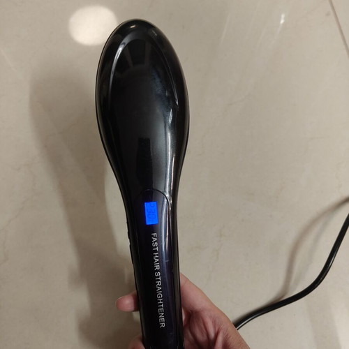 Electric Hair Brush used, heats up to 230°C