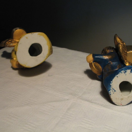 Pair of old clay angels like new