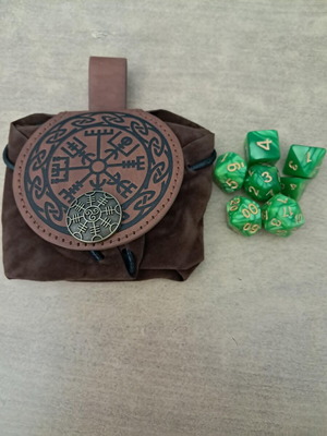 Round runic leather dice bag with green marbled D&D dice set