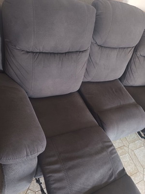 Three-seater sofa and armchair used
