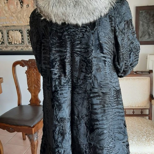 Fur coat used from natural Astrakhan fur with Silver Fox collar