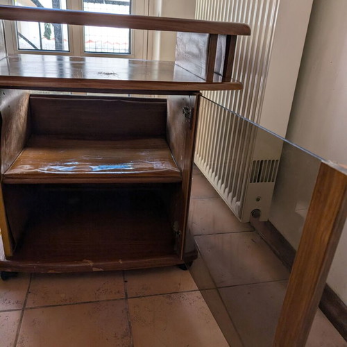 TV table used with wheels and glass door