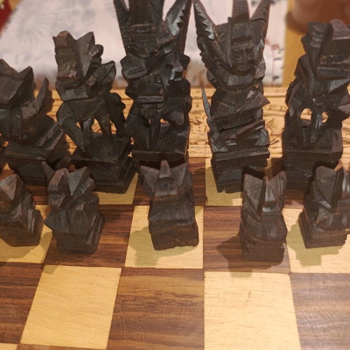 Carved backgammon/chess used with wooden Aztec-style pieces
