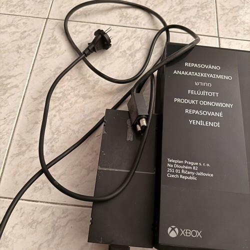 Xbox One Fat 500 GB console with MotoGP 18 game and controller