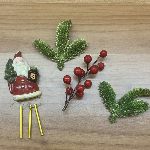 Santa Claus Christmas decoration set with bells and berries