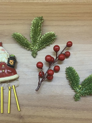 Santa Claus Christmas decoration set with bells and berries