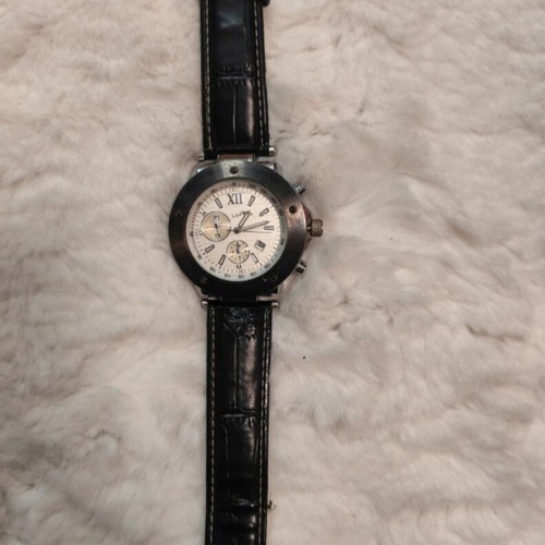 Lofty's men's watch used with worn strap and scratches