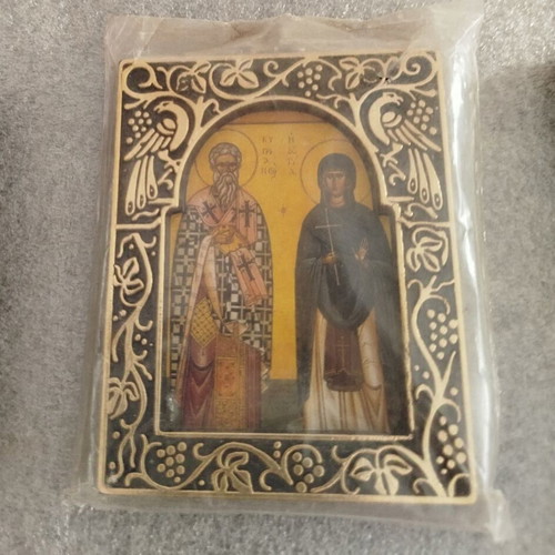 Pack of used old religious icons and crosses with Mount Athos photo