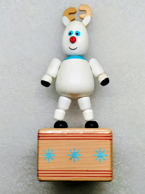 Wooden Christmas puppet toy used with movable joints