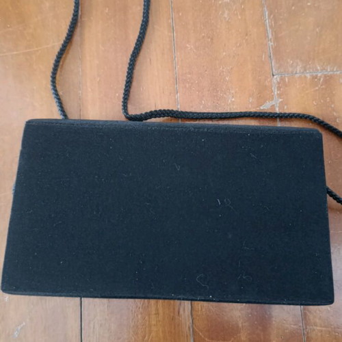 Shoulder bag like new, black with cord and button