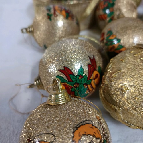 Christmas decorations like new, assorted ornaments and ribbon