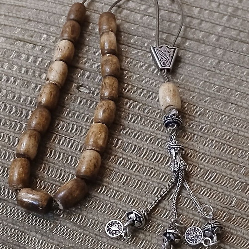 Worry beads made of bone used with oriental elements