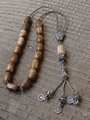 Worry beads made of bone used with oriental elements