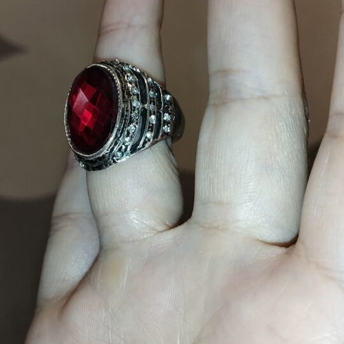 Statement cocktail ring with large red stone and rhinestones