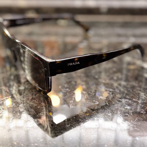 Prada sunglasses like new, unisex, black and brown