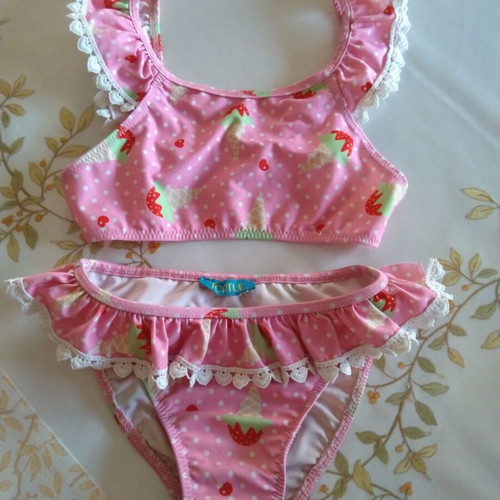 Girls' swimsuit used, colorful, sizes 104-110 cm