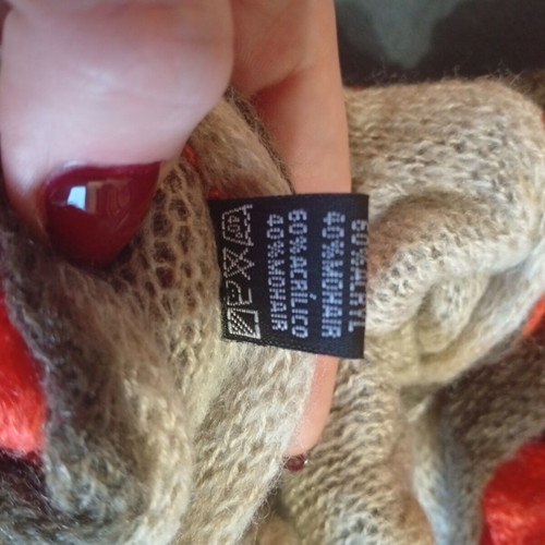 Set of 2 knitted Sprider scarves like new, black and white and orange with pom-poms