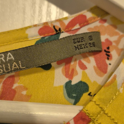 Sfera sleeveless top like new, floral pattern with studs