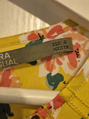 Sfera sleeveless top like new, floral pattern with studs