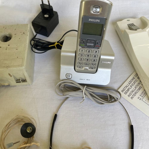Set of old cables, sockets and telephony devices used