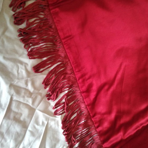 Bed cover used in red with multicolor embroidery and pillowcases
