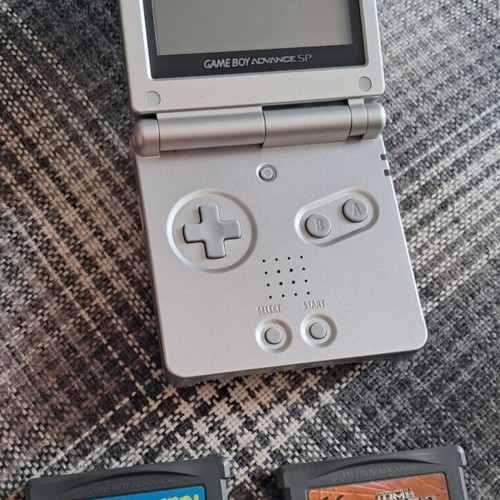 Game Boy Advance console with 2 games
