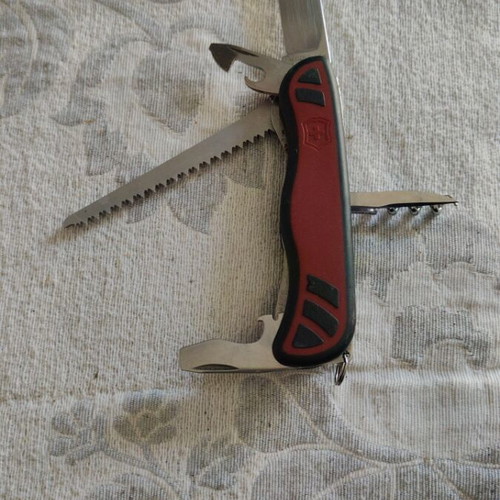 Victorinox Forester pocket knife like new with red and black handles