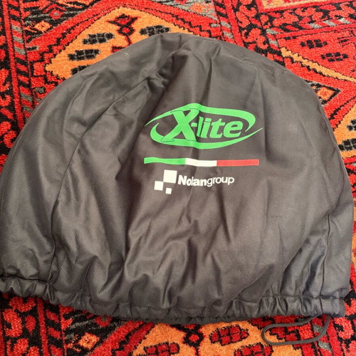 X-lite helmet case like new with unused Nolan case gift