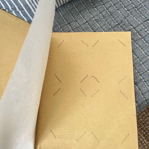 Photo album used with recycled paper, wood and natural leaf