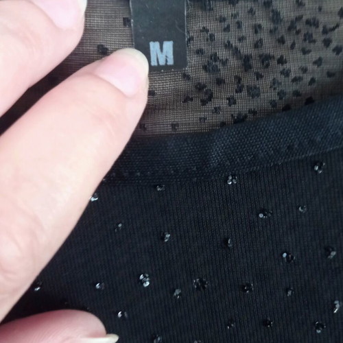 Black see through top with shimmer like new, medium to large size