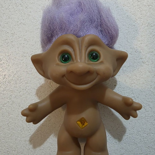 Efxoulis collectible with diamond, 1980s, used, trimmed hair