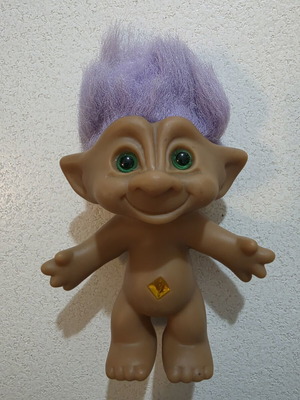 Efxoulis collectible with diamond, 1980s, used, trimmed hair