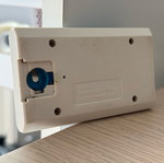 Mini retro arcade handheld console used without cover