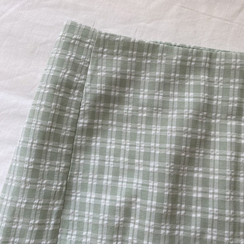 Shein mini skirt like new, light green and white with front slits
