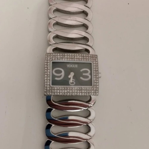 Vogue women's watch like new with rectangular case and crystals