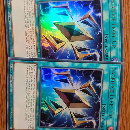 Sacrifice Level Up Yu-Gi-Oh! cards like new, 2 copies
