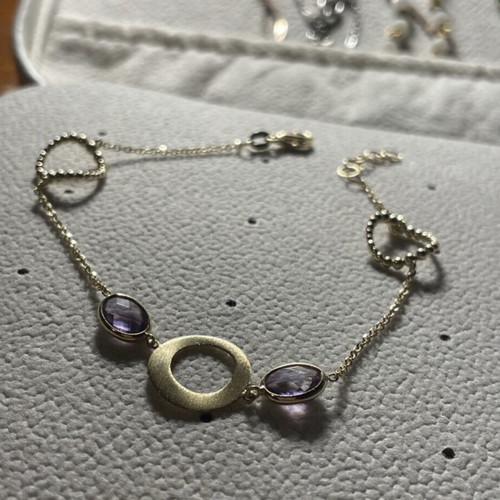Gold bracelet new with amethyst and lilac stones