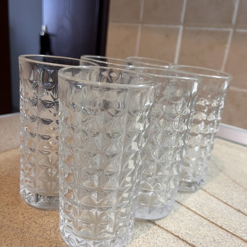 Water glasses set of 5 like new with embossed design