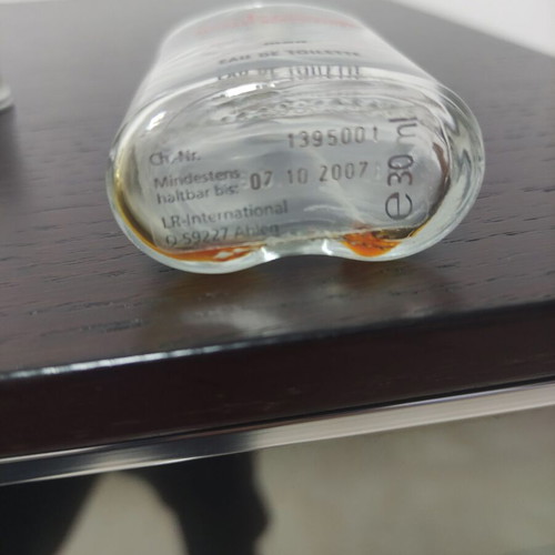 Empty Versace, Hugo Boss and Michael Schumacher perfume bottles used, collection pack