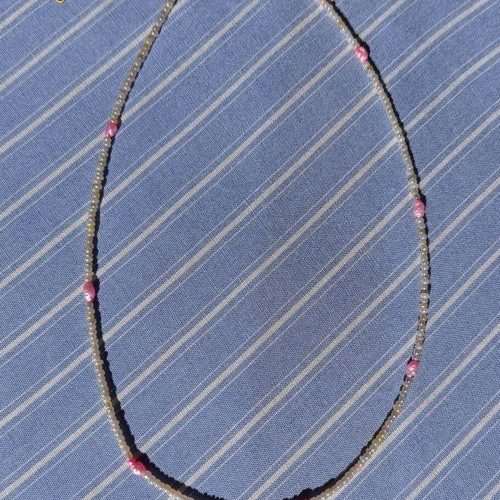 Necklace new, stainless wire with pink cultured pearls