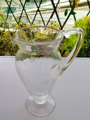 Cut glass pitcher used with minor wear