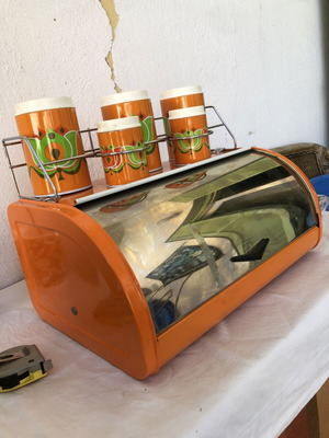 Vintage metal bread box with storage containers