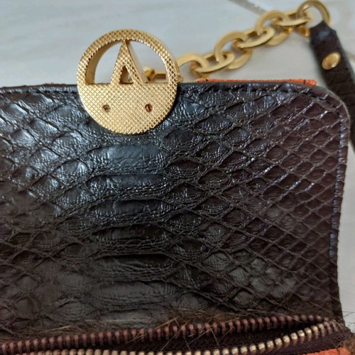 Handbag new with synthetic brown fur and croco print