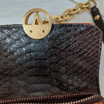 Handbag new with synthetic brown fur and croco print