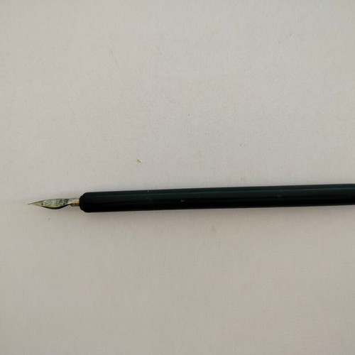 Old dip pen used with metal and wood wear