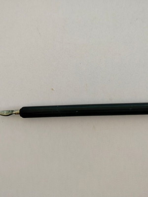 Old dip pen used with metal and wood wear