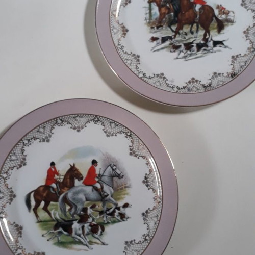 Porcelain plates used, two English with pink border