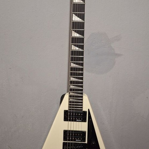 Jackson JS32 electric guitar set with Marshall amplifier and Behringer pedal
