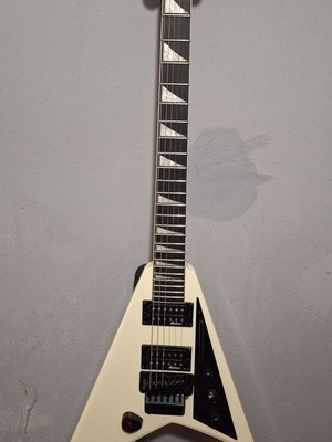 Jackson JS32 electric guitar set with Marshall amplifier and Behringer pedal